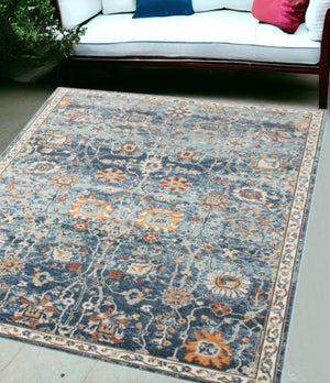 HomeRoots 5' Blue and Orange Floral Area Rug - Stain Resistant, Durable Design for Indoor & Outdoor Spaces Navy 5'1" x 7'6" 531505