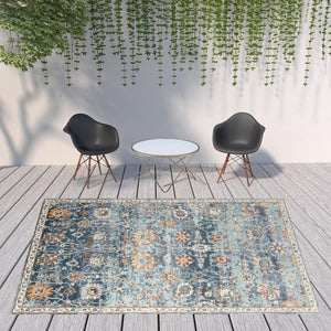 HomeRoots 5' Blue and Orange Floral Area Rug - Stain Resistant, Durable Design for Indoor & Outdoor Spaces Navy 8'9" x 11'9" 531507
