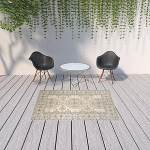 HomeRoots 5' Floral Medallion Area Rug - Vibrant Stain Resistant Design for Indoor & Outdoor Spaces, Durable Style Beige/Orange 5'1" x 7'6" 531517