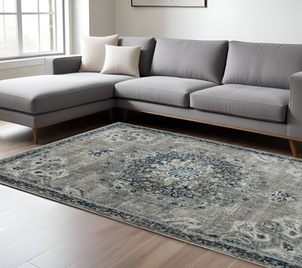HomeRoots 5' Bohemian-Inspired Teal Gray Ivory Area Rug - Durable, Stain-Resistant, and Stylish for Any Space 9' x 12' 531603