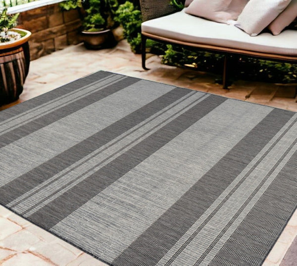 HomeRoots 8' Striped Stain Resistant Area Rug for Indoor or Outdoor Spaces – Durable, Low Maintenance Design! Silver 8' x 10' 531648