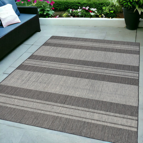 HomeRoots 8' Striped Stain Resistant Area Rug for Indoor or Outdoor Spaces – Durable, Low Maintenance Design! Silver 6'6" x 9'10" 531652