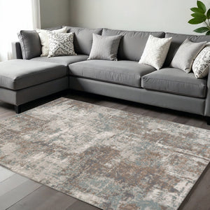 HomeRoots 10' Contemporary Abstract Area Rug in Ivory, Brown, and Green - Stain-Resistant for Family Spaces 6' X 9' 531710