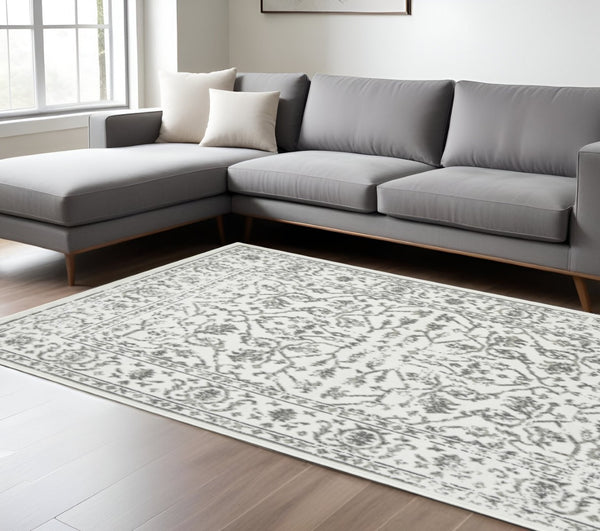 HomeRoots 10' Elegant Ivory Gray Floral Area Rug – Durable, Stain Resistant, Perfect for Family Living Spaces 9' X 12' 531761