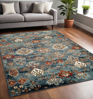 Homeroots 5' X 8' Teal Rust And Orange Oriental Power Loom Area Rug  Polypropylene 531771
