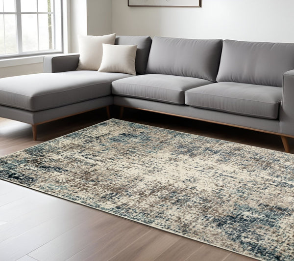 HomeRoots 8' Abstract Ivory Blue and Gray Area Rug – Contemporary Style, Durable, Soft, and Easy Care for Homes 9' X 12' 531809