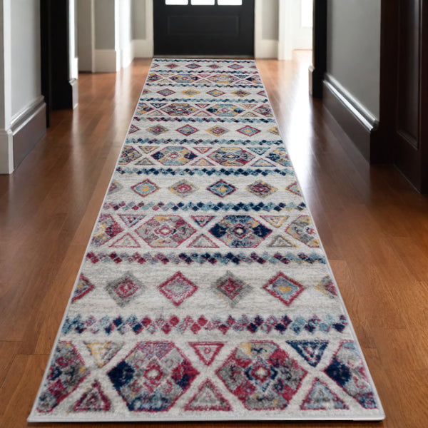 Homeroots 10' Ivory Blue And Orange Geometric Power Loom Runner Rug  Polypropylene 531861