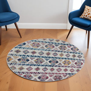 Homeroots 6' Ivory Blue And Orange Geometric Power Loom Round Rug  Polypropylene 531863