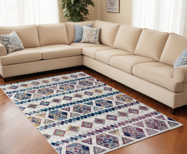 Homeroots 9' X 12' Ivory Blue And Orange Geometric Power Loom Area Rug  Polypropylene 531865