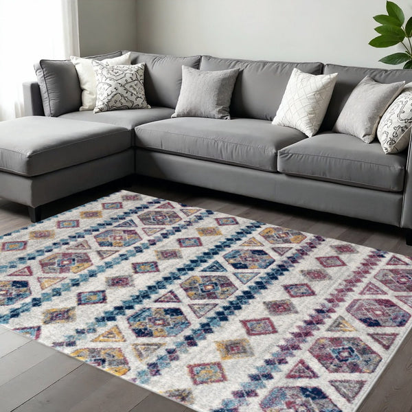 HomeRoots 5' Geometric Area Rug in Ivory, Blue, and Orange - Modern Design for Comfort and Style in Any Room 9' X 12' 531865