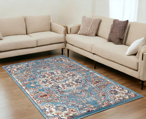 Homeroots 5' X 8' Ivory Blue And Orange Medallion Power Loom Area Rug  Polypropylene 531870