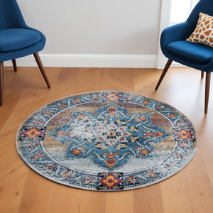 HomeRoots 5' Striking Medallion Area Rug in Blue, Red, and Orange - Durable, Pet-Friendly Design for Any Room 6' Round 531879