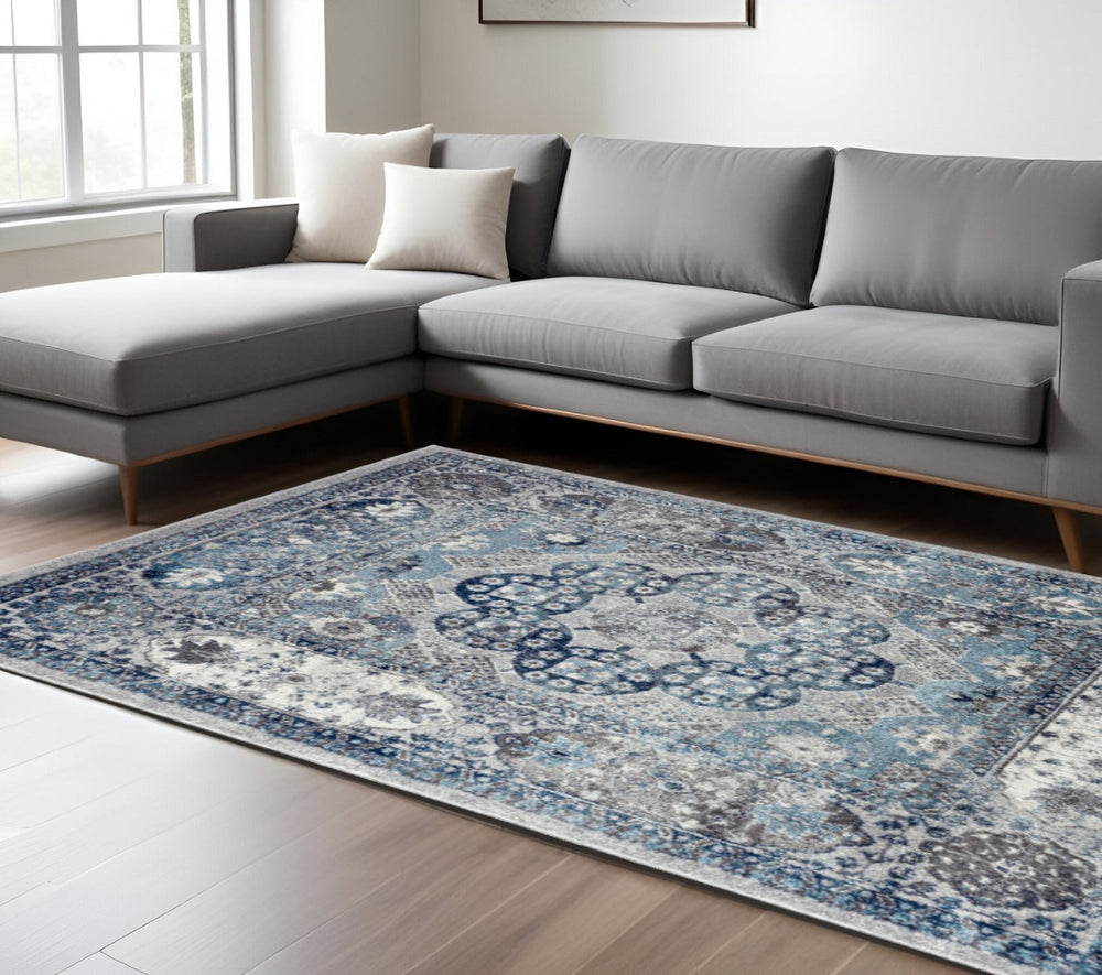 HomeRoots 5' Timeless Ivory Blue and Gray Medallion Area Rug for Elegant Living Spaces and Easy Care 9' X 12' 531889