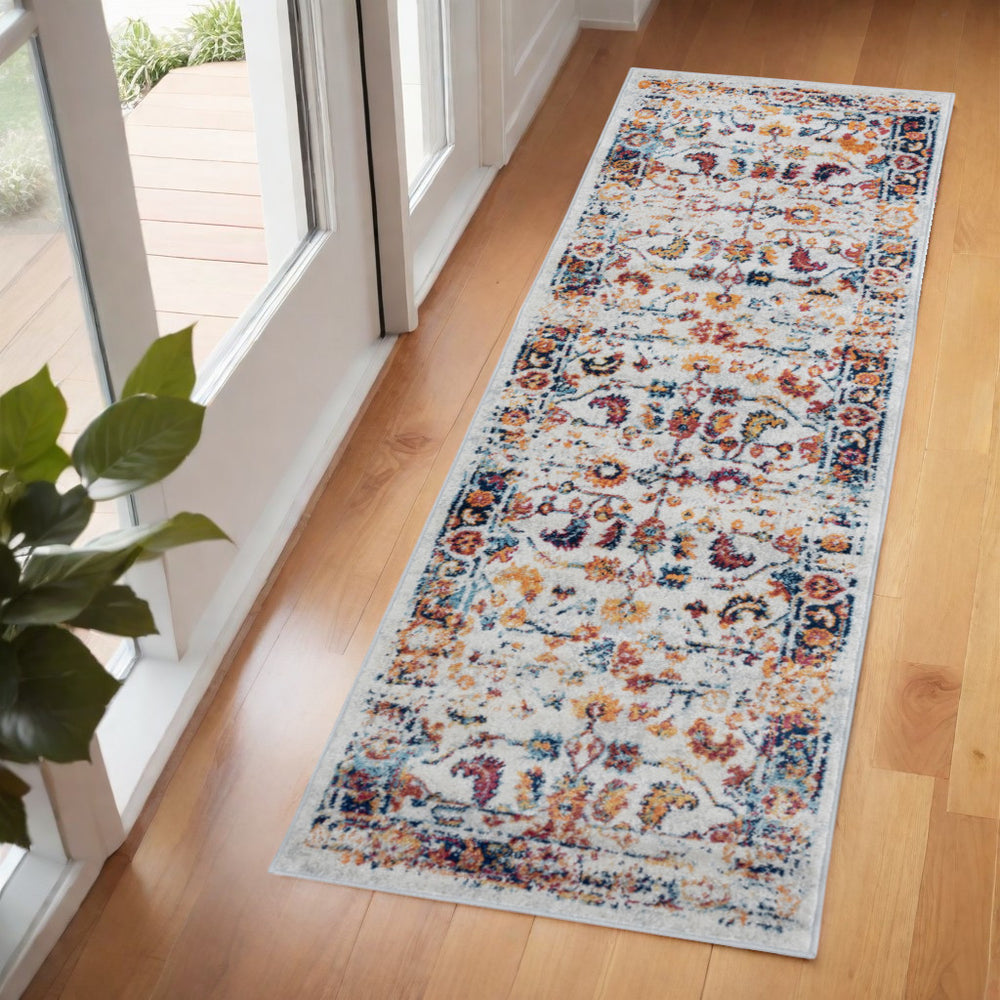 Homeroots 6' Elegant Ivory Navy And Orange Floral Power Loom Runner Rug For Stylish Home Décor And Comfort 2' X 6' Polypropylene 531891