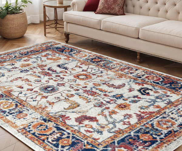 HomeRoots 5' Elegant Ivory Navy and Orange Floral Area Rug - Durable, Pet-Friendly Design for Busy Homes 5' X 8' 531894
