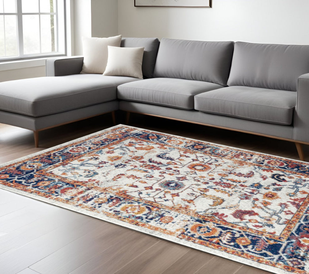 HomeRoots 5' Elegant Ivory Navy and Orange Floral Area Rug - Durable, Pet-Friendly Design for Busy Homes 8' X 10' 531896