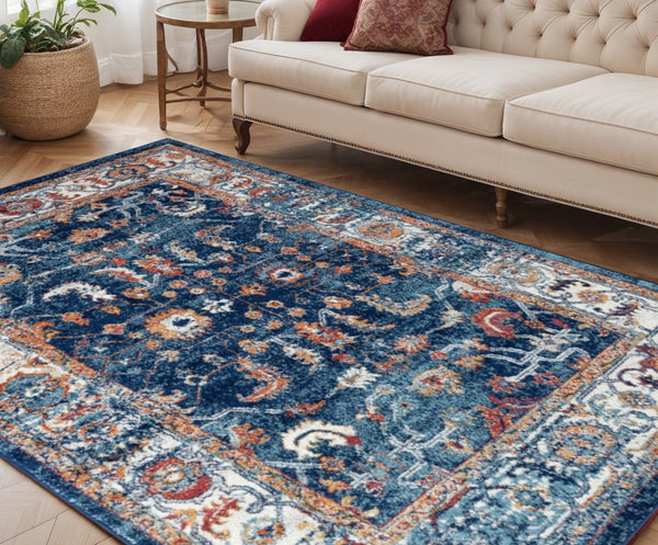HomeRoots 5' Elegant Ivory Navy and Orange Floral Area Rug - Durable, Pet-Friendly Design for Busy Homes 5' X 8' 531902