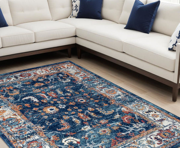 HomeRoots 5' Elegant Ivory Navy and Orange Floral Area Rug - Durable, Pet-Friendly Design for Busy Homes 9' X 12' 531905