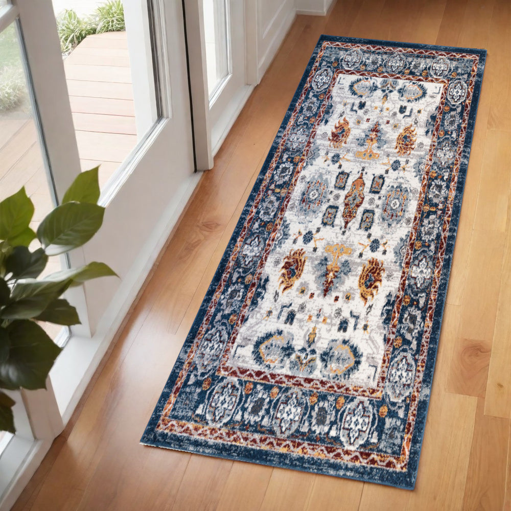Homeroots 6' Ivory Brown And Orange Floral Power Loom Runner Rug - Stylish, Stain-resistant, Pet-friendly Design 2' X 6' Polypropylene 531923