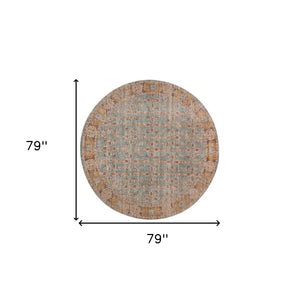 Homeroots 6' Teal Red And Orange Oriental Power Loom Worn Faded Round Rug  Polypropylene 532115