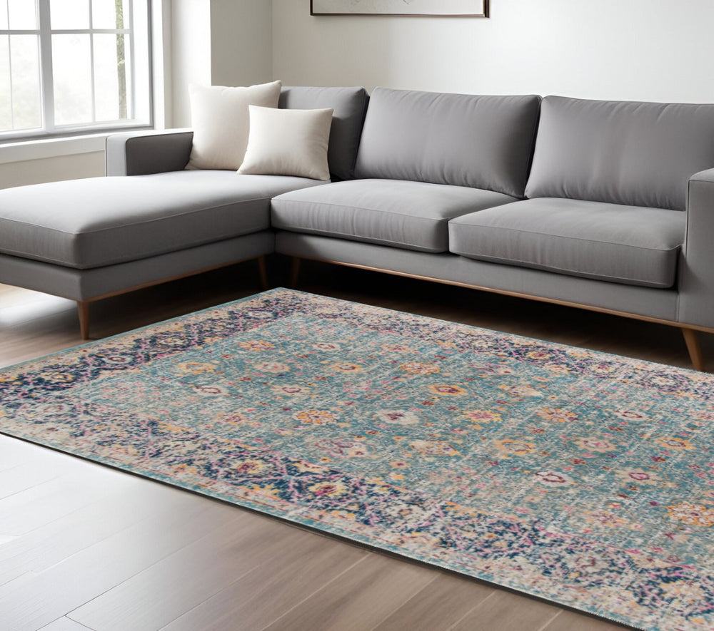 HomeRoots 6' Turquoise and Orange Floral Distressed Area Rug - Vintage Style for Living Rooms and Bedrooms 6' X 8' 532122