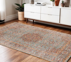 HomeRoots 4' Medallion Area Rug in Teal, Red, and Orange - Durable, Stain-Resistant, Stylish for High Traffic Areas 4' X 6' 532129