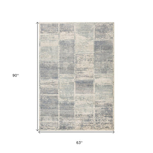 HomeRoots 10' Geometric Runner Rug in Gray, Light Blue & Ivory – Stylish, Durable & Easy-Care for High-Traffic Areas 5' X 8' 532137