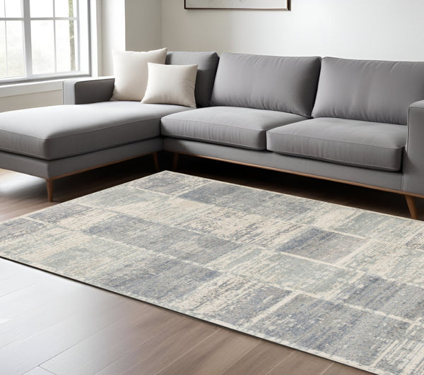 HomeRoots 10' Geometric Runner Rug in Gray, Light Blue & Ivory – Stylish, Durable & Easy-Care for High-Traffic Areas 9' X 12' 532140