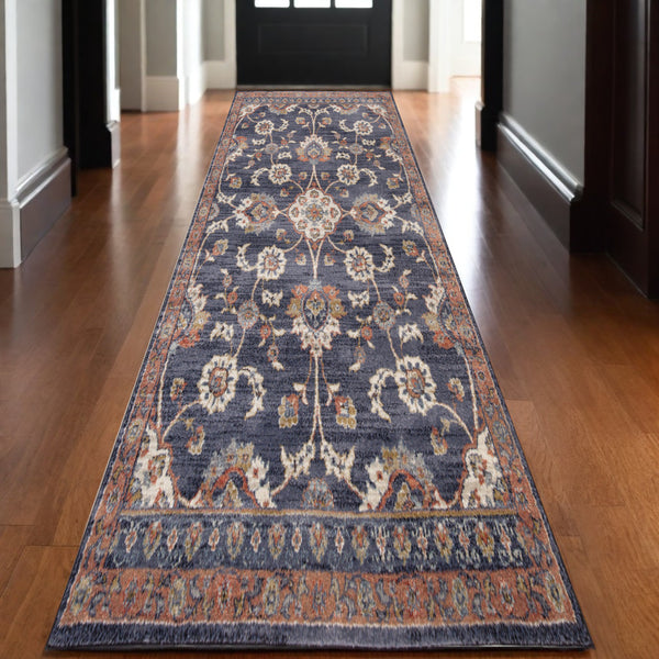 Homeroots 10' Ivory Navy And Orange Floral Power Loom Runner Rug  Polypropylene 532154
