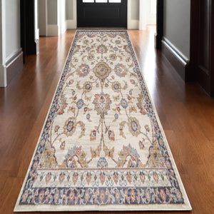 Homeroots 10' Ivory Navy And Orange Floral Power Loom Runner Rug  Polypropylene 532166