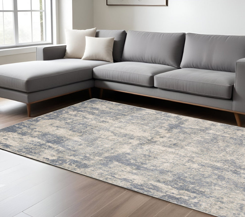 HomeRoots 10' Abstract Light Gray, Blue, and Ivory Runner Rug - Durable, Stain-Resistant Design for High-Traffic Areas 6' X 9' 532180