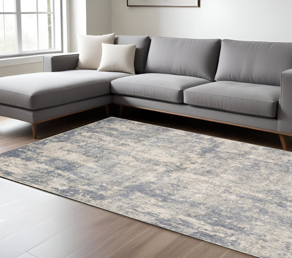HomeRoots 10' Abstract Light Gray, Blue, and Ivory Runner Rug - Durable, Stain-Resistant Design for High-Traffic Areas 6' X 9' 532180