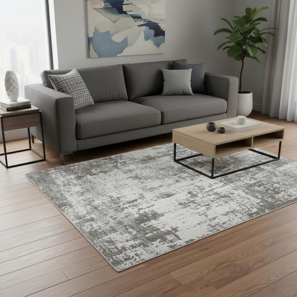 HomeRoots 5' Ivory and Gray Abstract Area Rug - Modern Design for Effortless Style and Lasting Durability 5' X 8' 532295