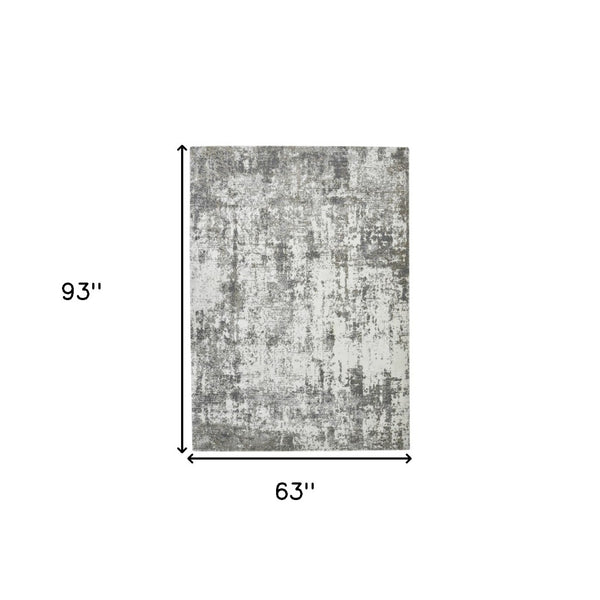 HomeRoots 5' Ivory and Gray Abstract Area Rug - Modern Design for Effortless Style and Lasting Durability 5' X 8' 532295