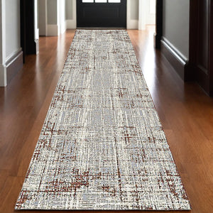 Homeroots 10' Abstract Ivory Blue And Gray Runner Rug - Durable, Stylish, And Perfect For Any Space Decor 10' Runner Polypropylene,Polyester 532306