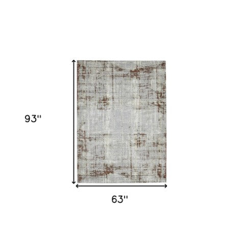 Homeroots 10' Abstract Ivory Blue And Gray Runner Rug - Durable, Stylish, And Perfect For Any Space Decor 5' X 8' Polypropylene,Polyester 532307