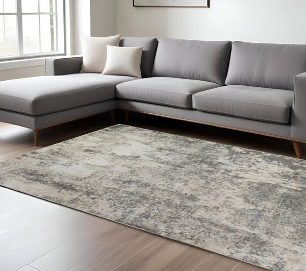 HomeRoots 9' Modern Ivory and Gray Abstract Area Rug - Stylish, Durable Design for Living and Dining Spaces 9' X 12' 532357