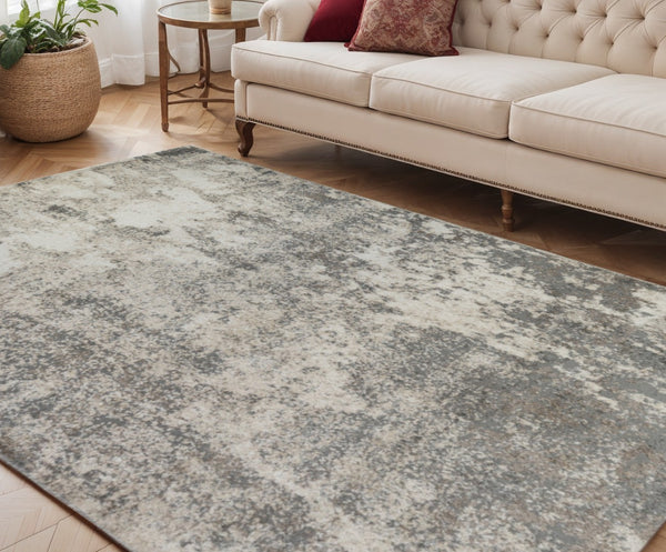 HomeRoots 9' Modern Ivory and Gray Abstract Area Rug - Stylish, Durable Design for Living and Dining Spaces 5' X 8' 532360