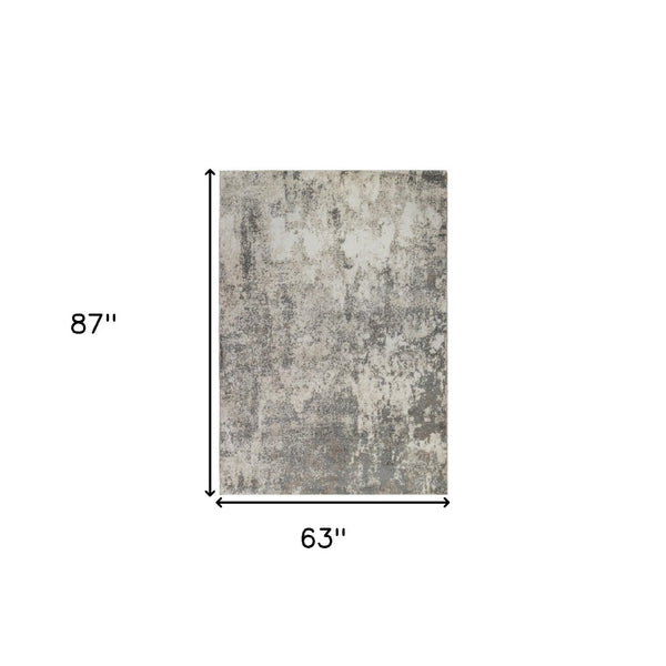 HomeRoots 9' Modern Ivory and Gray Abstract Area Rug - Stylish, Durable Design for Living and Dining Spaces 5' X 8' 532360