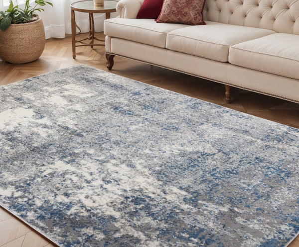HomeRoots 9' Modern Ivory and Gray Abstract Area Rug - Stylish, Durable Design for Living and Dining Spaces 5' X 8' 532366