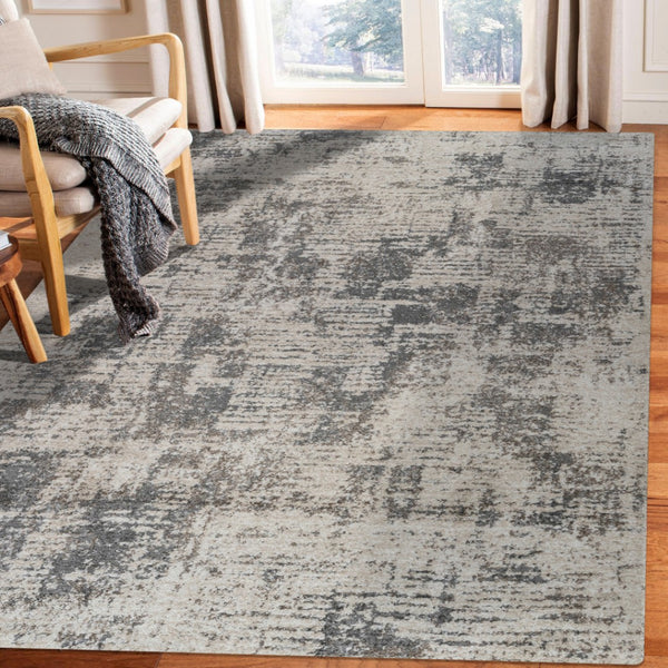 HomeRoots 9' Gray and Beige Abstract Area Rug - Modern Power Loomed Design for Living Space Comfort & Style 9' X 12' 532387