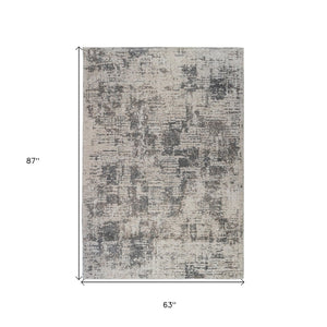 HomeRoots 9' Gray and Beige Abstract Area Rug - Modern Power Loomed Design for Living Space Comfort & Style 5' X 8' 532390
