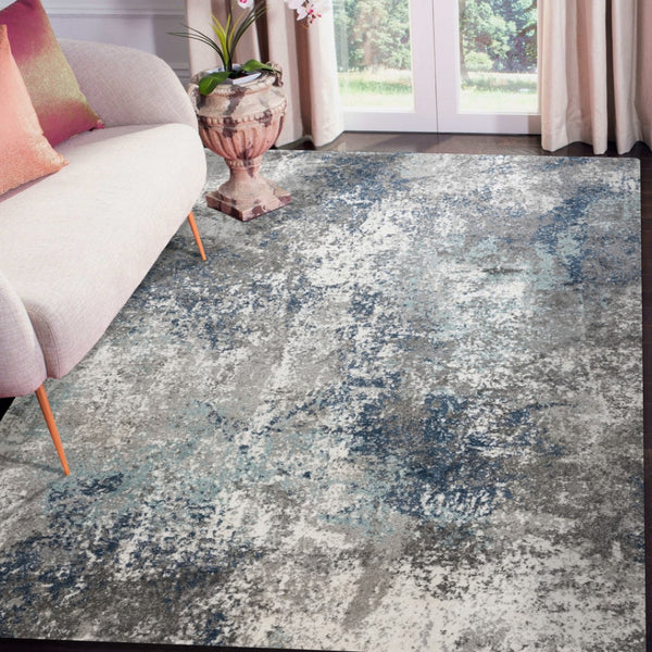 HomeRoots 9' Modern Abstract Area Rug in Ivory, Blue, and Gray - Soft, Durable, and Stylish for Any Room 5' X 8' 532396