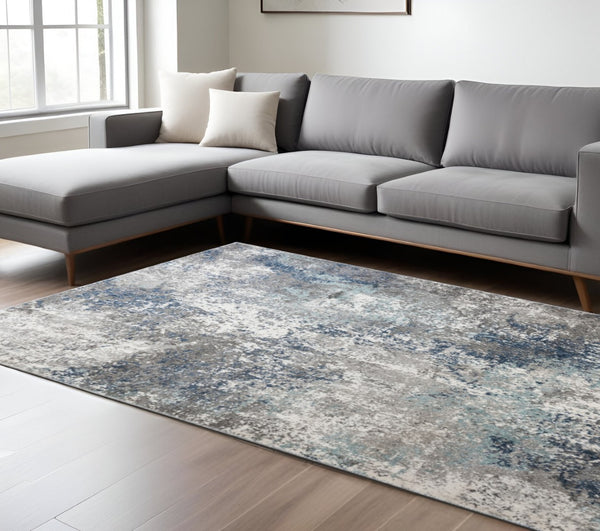 HomeRoots 9' Cream and Gray Abstract Area Rug - Power Loomed for Modern Elegance and Everyday Durability 9' X 12' 532399