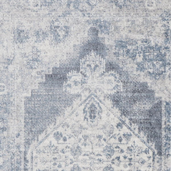 Homeroots 5' X 7' Blue And Ivory Abstract Power Loom Washable Area Rug  Polyester 532825