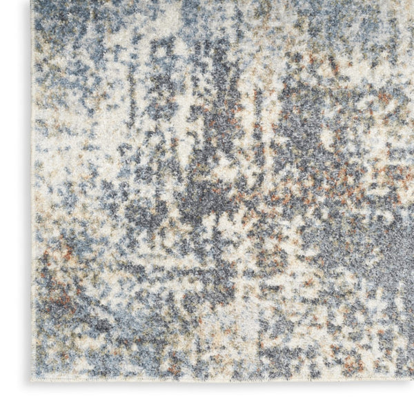 HomeRoots 7' Blue and Ivory Abstract Power Loom Area Rug - Modern, Washable, Low-Pile for Easy Maintenance 7' X 9' 532826