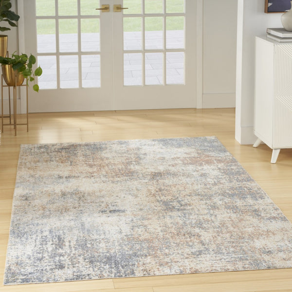 HomeRoots 7' Blue and Ivory Abstract Power Loom Area Rug - Modern, Washable, Low-Pile for Easy Maintenance 7' X 9' 532826