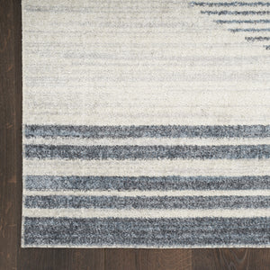 Homeroots 7' X 9' Ivory Blue And Gray Animal Print Power Loom Washable Area Rug  Polyester 532842