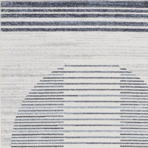 Homeroots 7' X 9' Ivory Blue And Gray Animal Print Power Loom Washable Area Rug  Polyester 532842