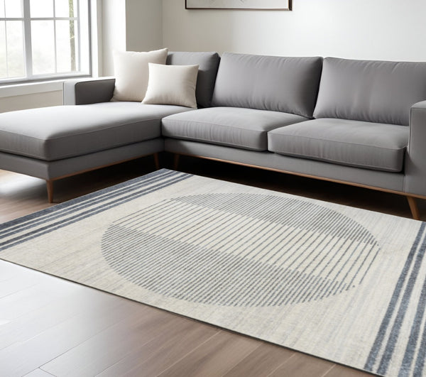 HomeRoots 7' Blue and Ivory Geometric Area Rug - Modern, Washable Design for Stylish Living Spaces and Comfort 7' X 9' 532863